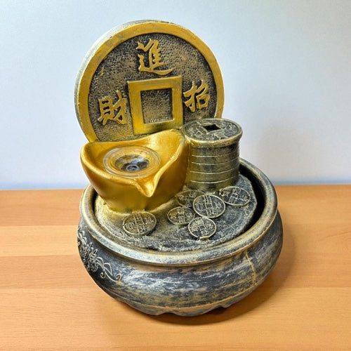 Fuente Moneda Dorada